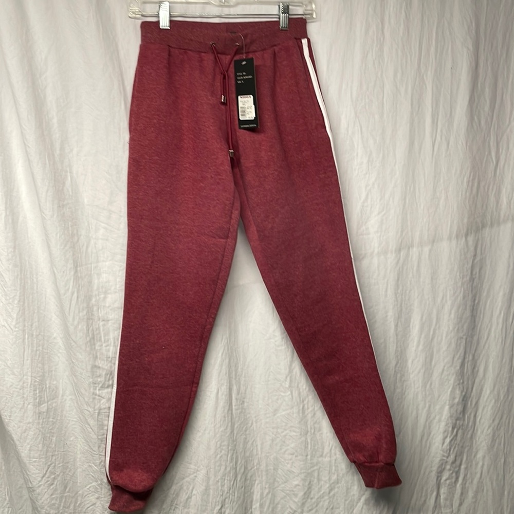 Women’s fleece jogger sweat pants. Burgundy and white, size small.